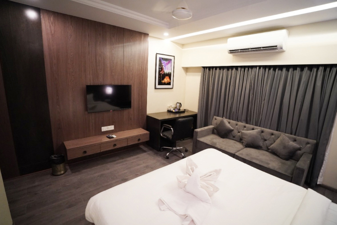 Comfortable and stylish guest room at Hotel Suffa International